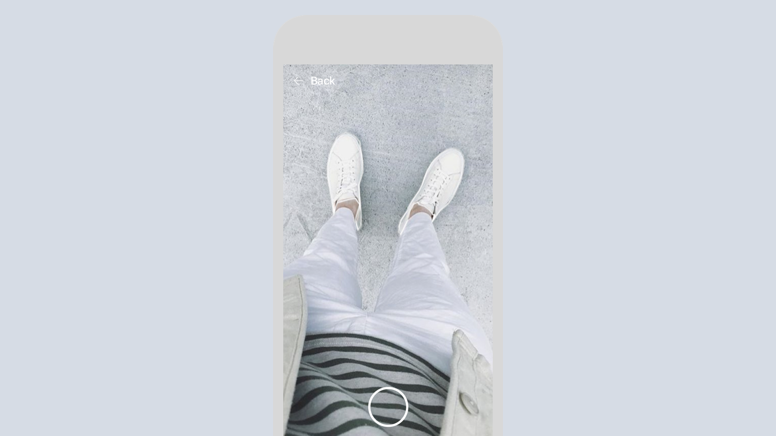 With Try it on, Bing will use AR to show Tiffany what the pair of sneaker looks like on her.