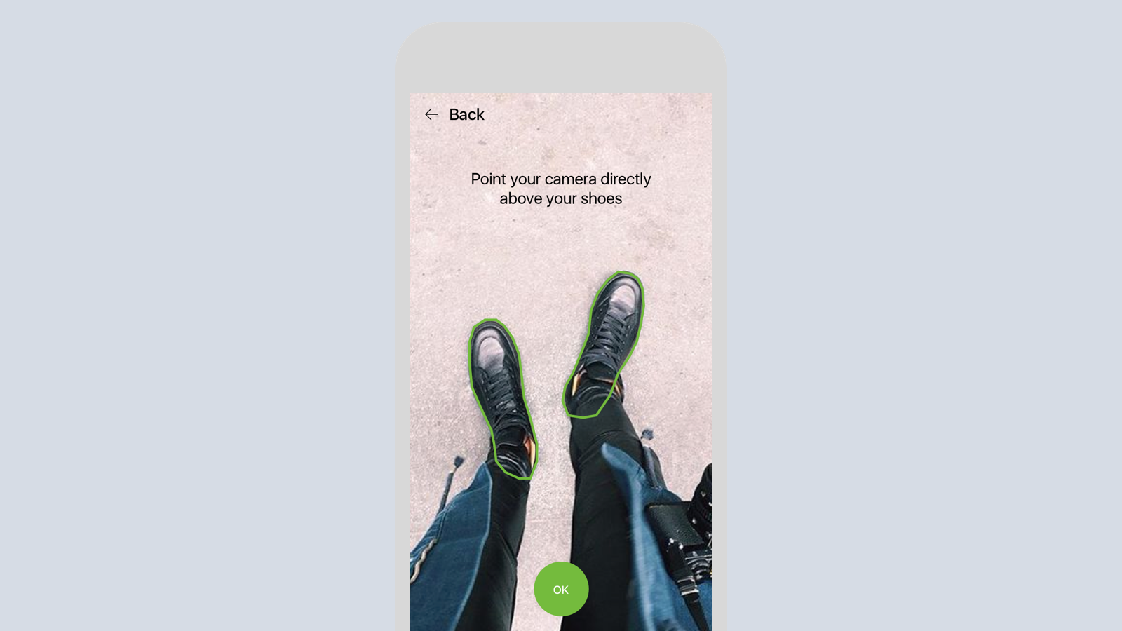 Finally, Find my size uses the camera and computer vision technology to measure Tiffany's foot and tell her what her shoe size should be for this pair of sneaker.