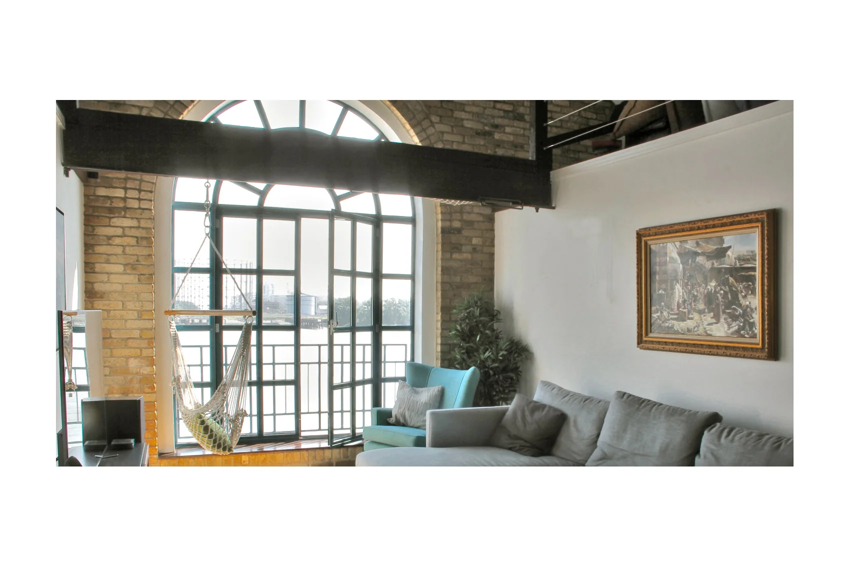 warehouse conversion Main lounge with impressive window.jpg
