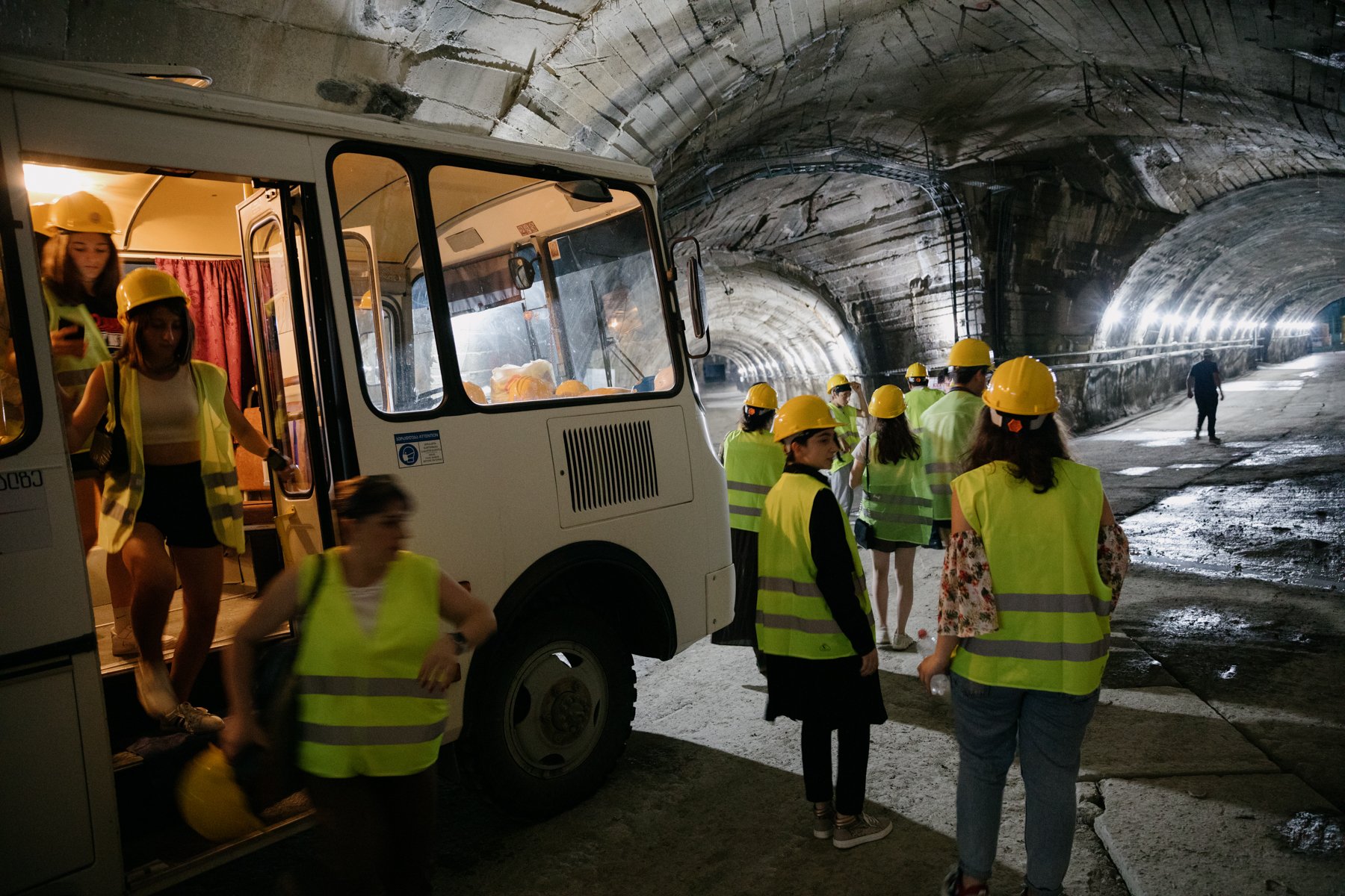  A school group from Tsalenjikha tours the Enguri Dam. At the end of the tunnel on the right are the pipes that feed water to hydroelectric power plants in Abkhazia. 