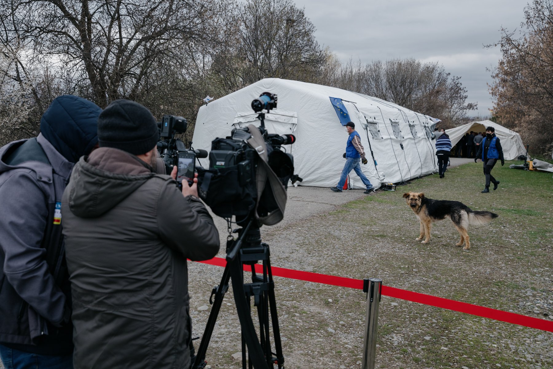  Members of the Georgian media photograph a dog at an Incident Prevention and Response Mechanism (IPRM) meeting held in no man's land in Ergneti. 