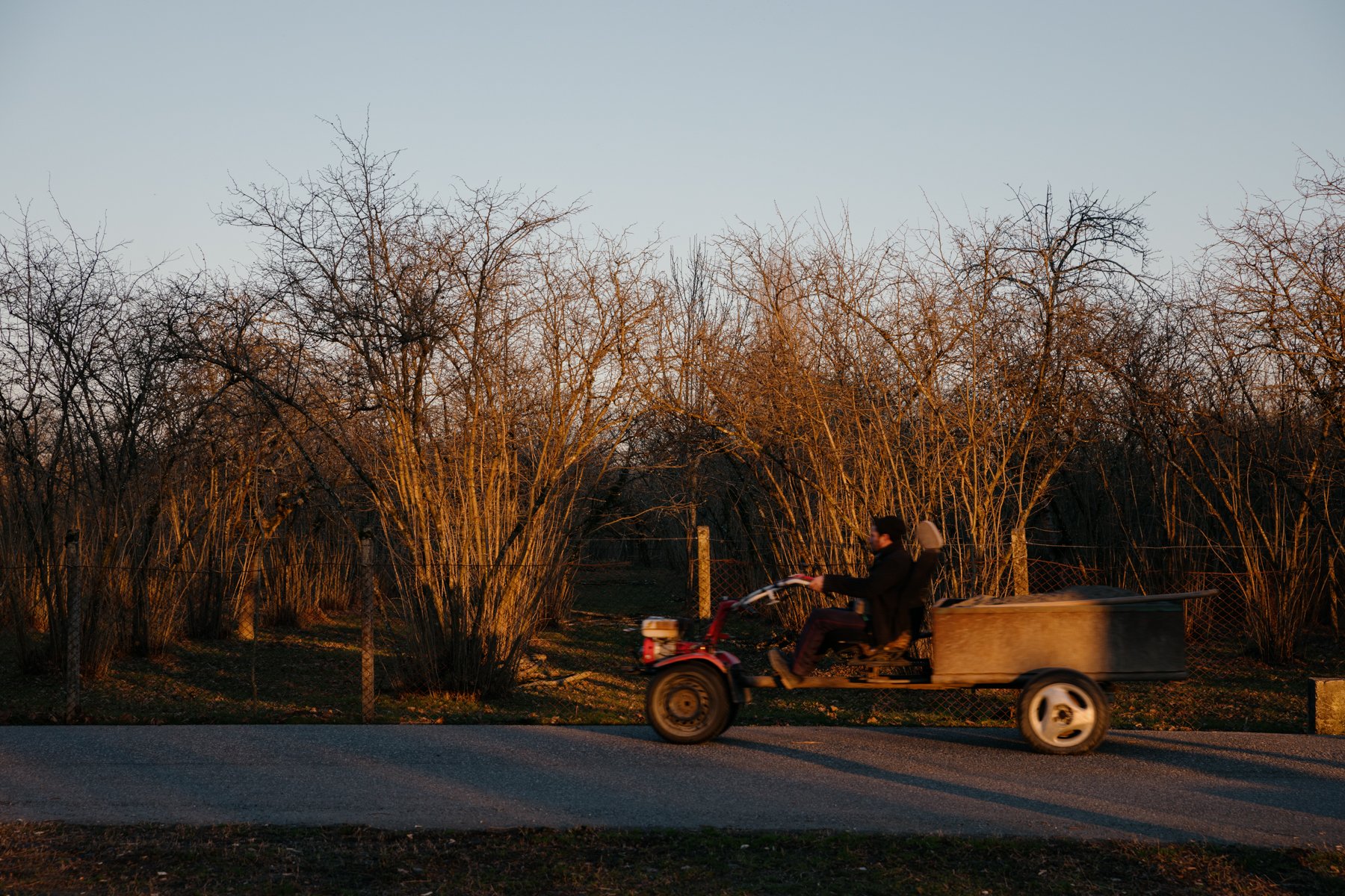  A villager drives his tractor along the southern bank of the Enguri River in Orsantia. 