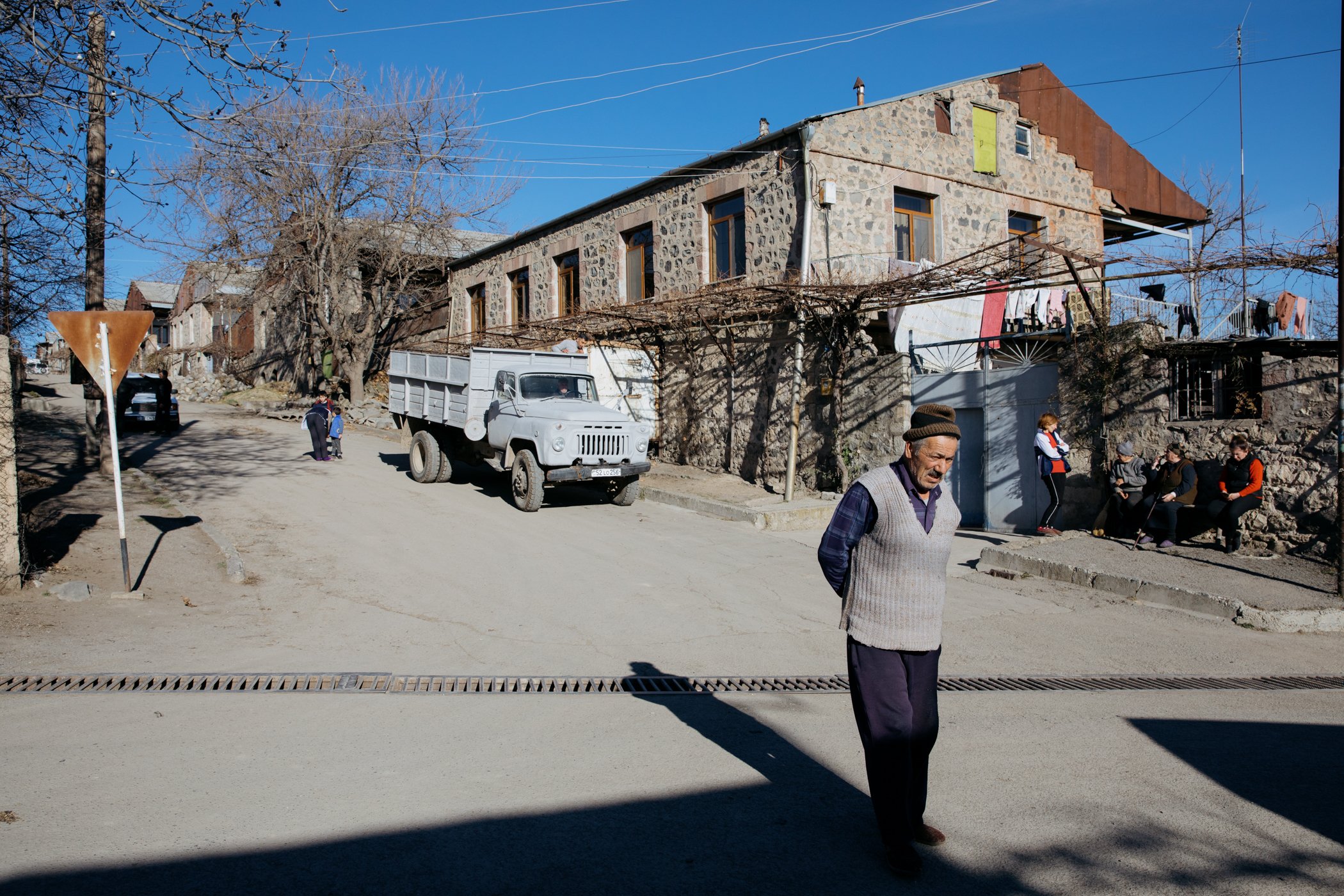  Residents of the Armenian border village of Kornidzor enjoy a sunny day in mid December. 