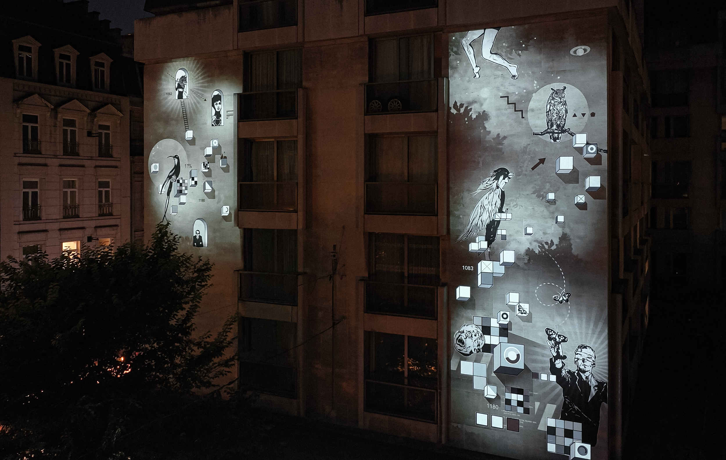 Augmented mural projection at night in Brussels, where animated light and shadows activate the artwork in public space.