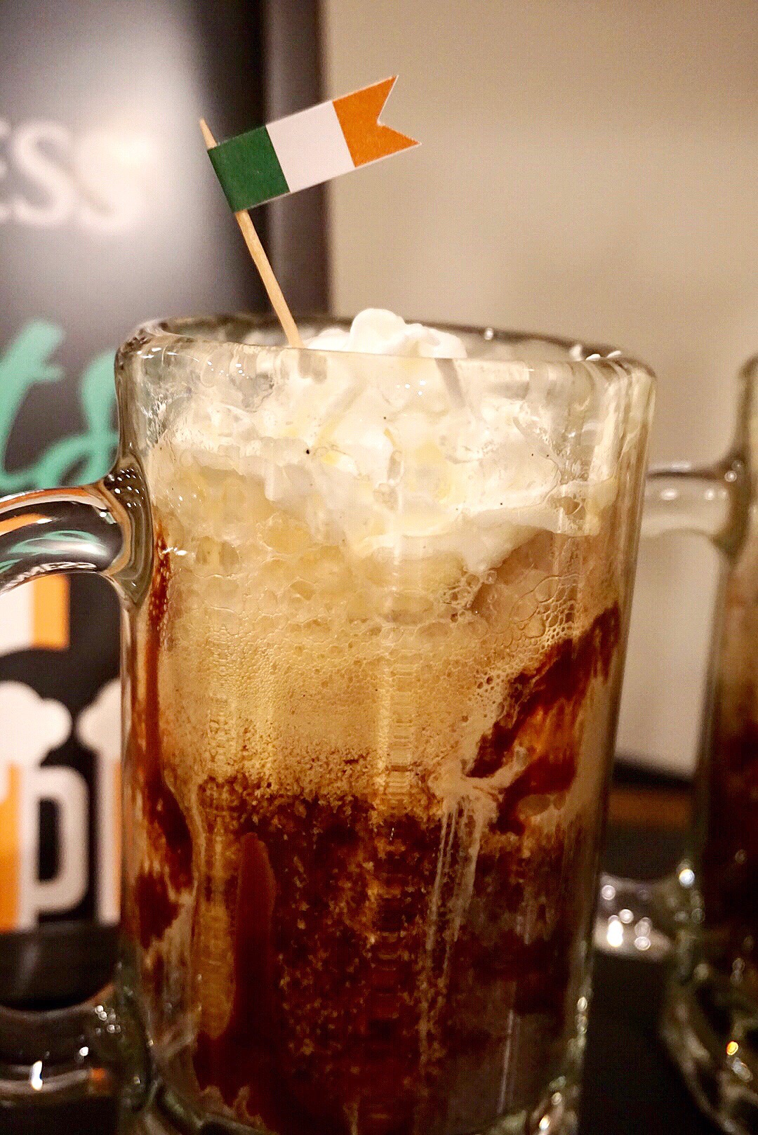 Guinness floats made of coffee ice cream, Guinness, chocolate and caramel plus a little whipped topping.