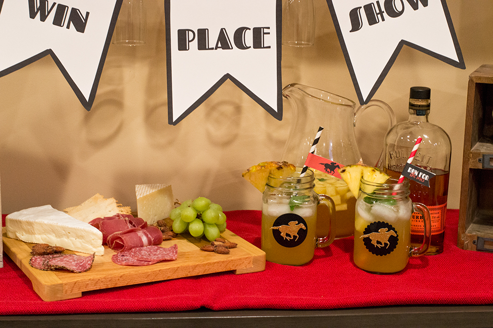 Mint julep sangria and a meat and cheese board make great snacks during the Kentucky Derby.