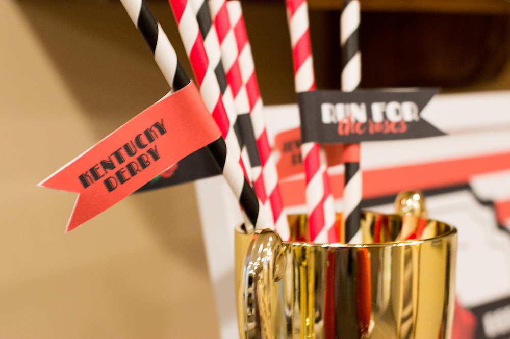 Straw flags dress up black and red paper straws for the Kentucky Derby.