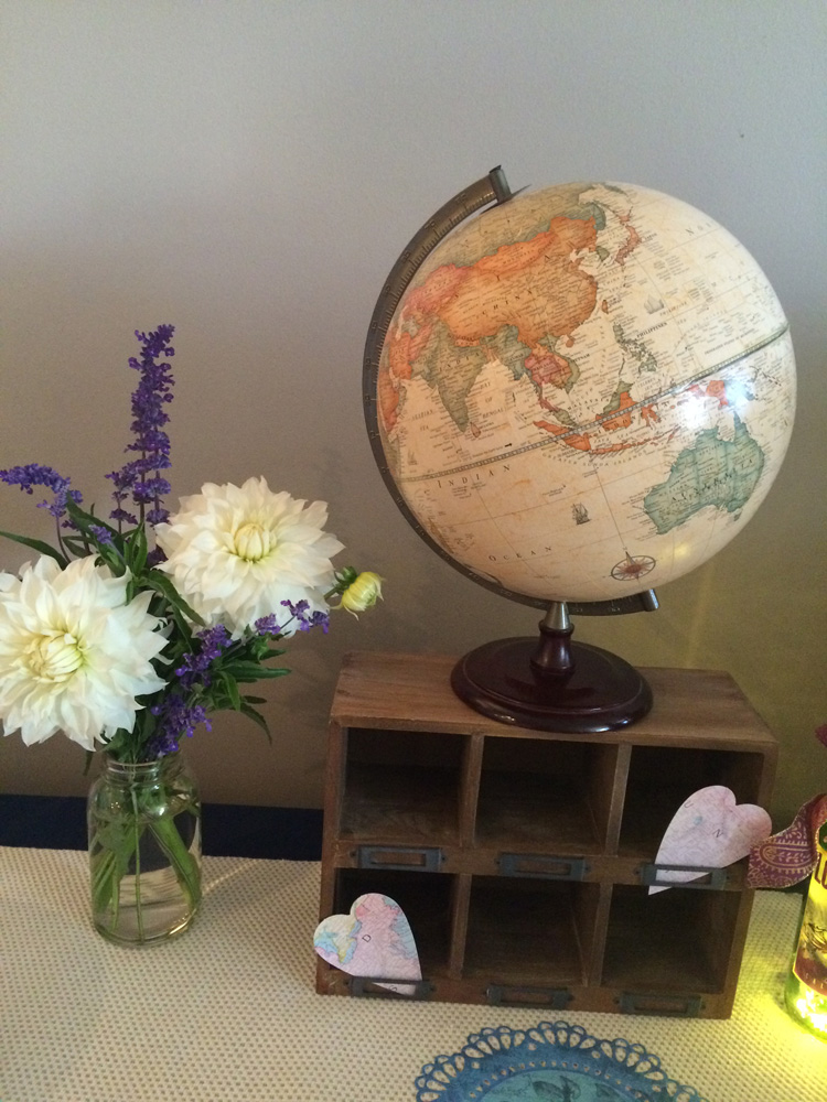  A globe and wood box make great decor for a travel themed bridal shower. 