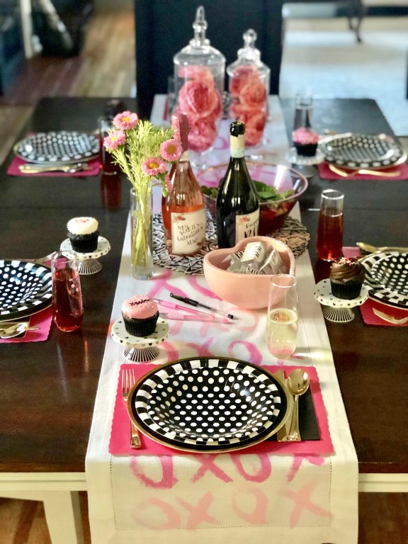 DIY Galentine’s Day XOXO table runner in white and pink.