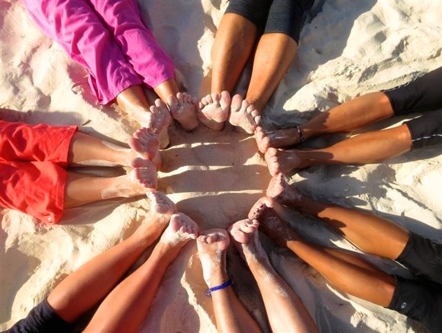 yoga feet in the sand