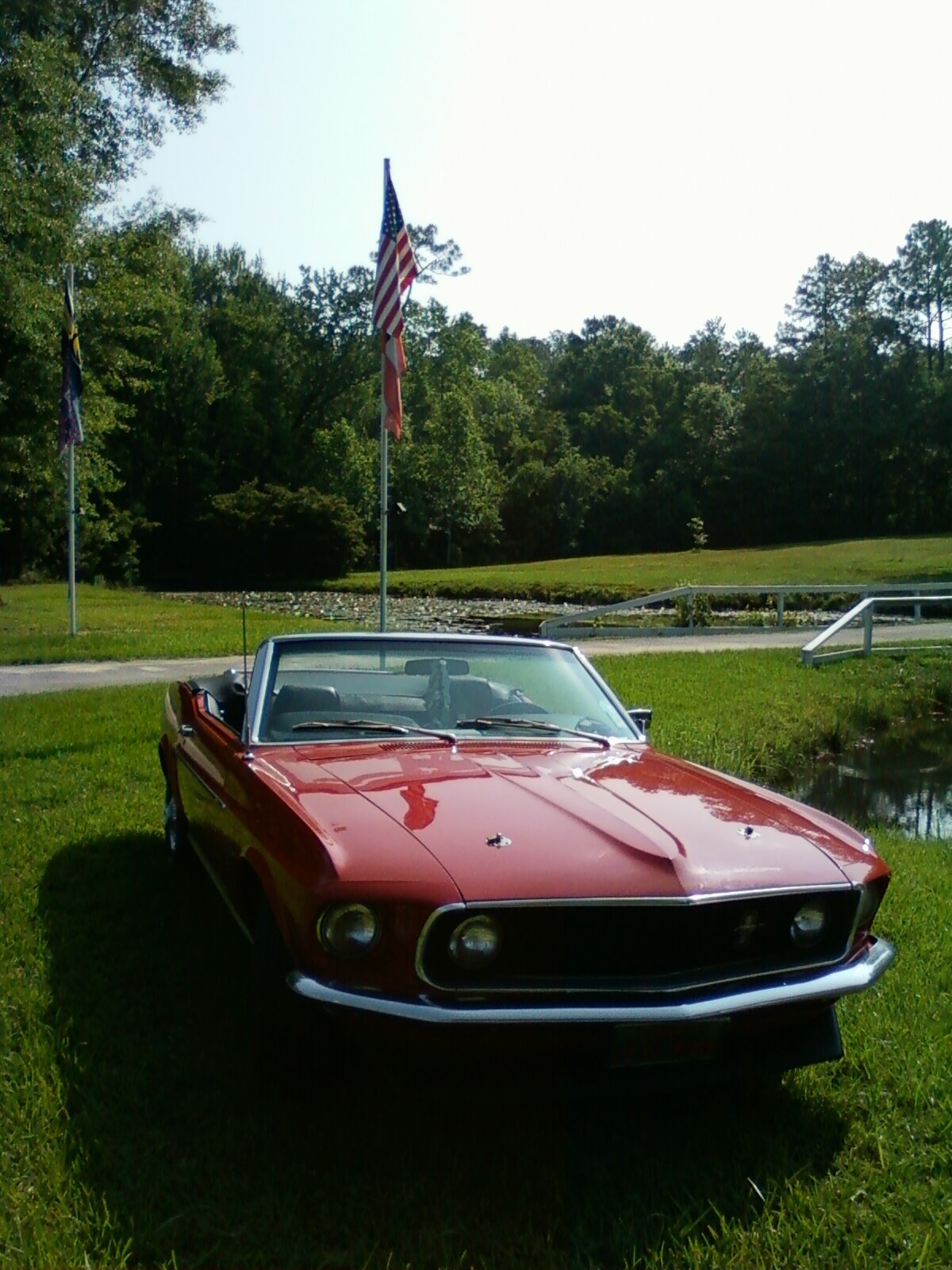 69 Mustang at flag pole.jpg
