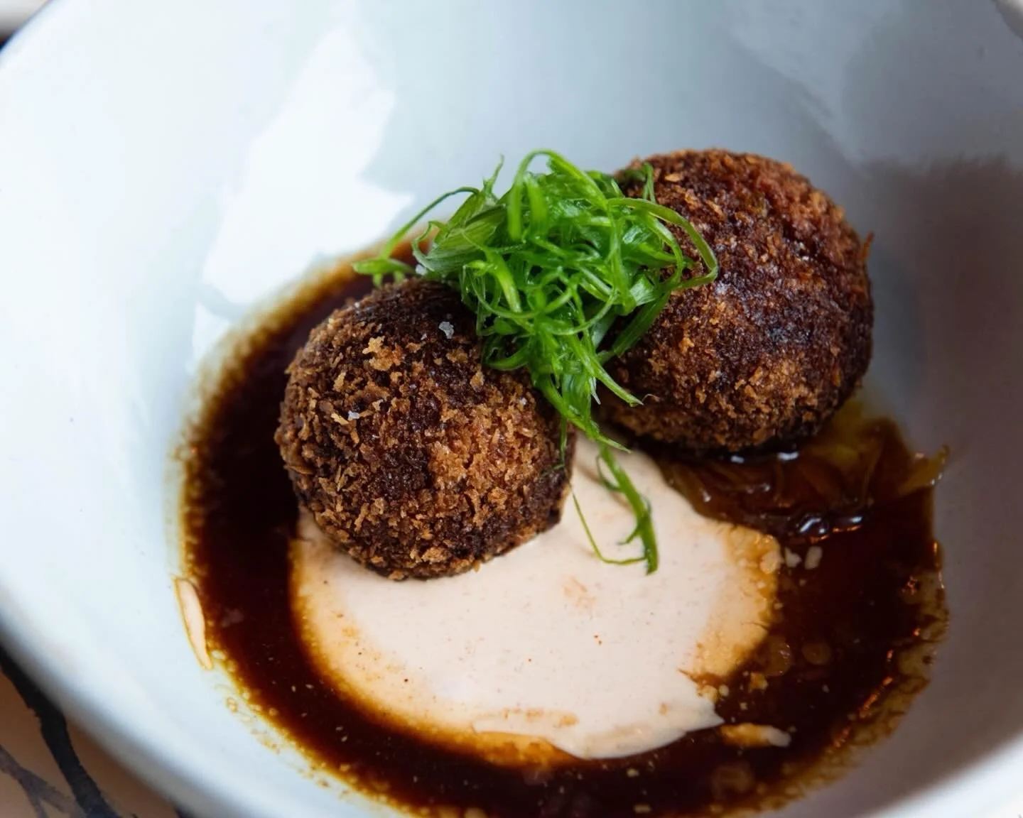 Served with gochujang cream and Meyer lemon marmalade, our Oxtail Croquettes are crispy on the outside, with a rich and savory interior.

Perfect as a solo indulgence or shared with someone special. We&rsquo;ll let you decide 😉