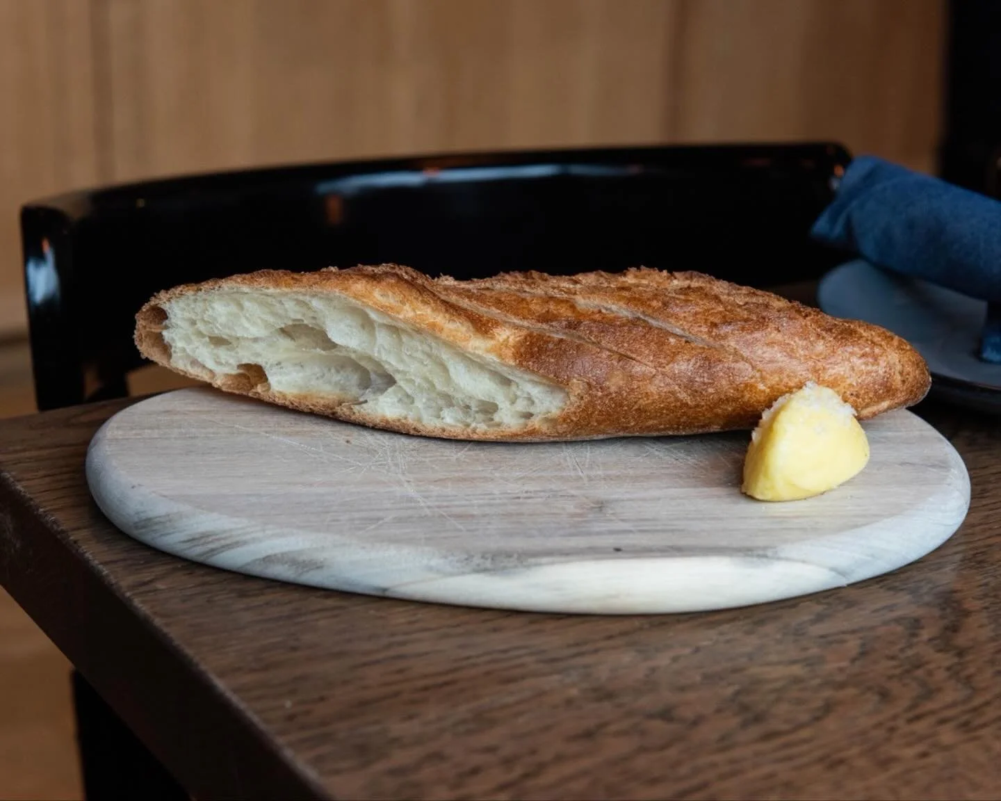 Artisan Baguette from @kensartisan 🥖

Served with R. Meunier butter and fancy salt.

A much needed accompaniment to your meal at Normandie.

#NormandiePDX #PDXEats