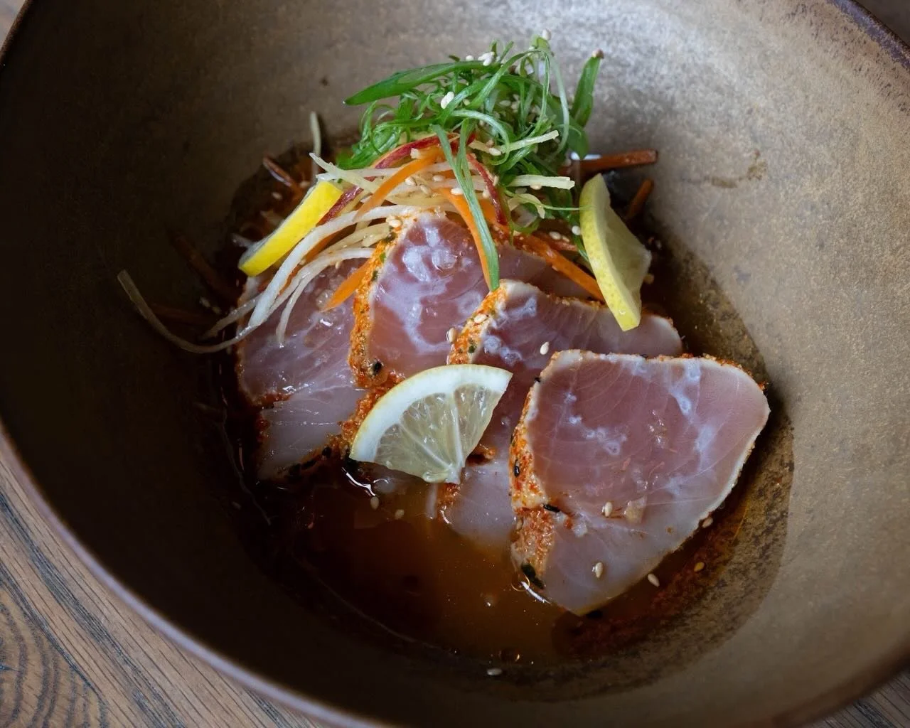 Albacore&hellip; but make it Normandie ✨

Togarashi-crusted and lightly seared, our albacore is then placed into a carrot dashi with shredded carrot salad, carrot vinaigrette, sesame, scallion, and chili oil.

This dish is an homage to sushi culture,