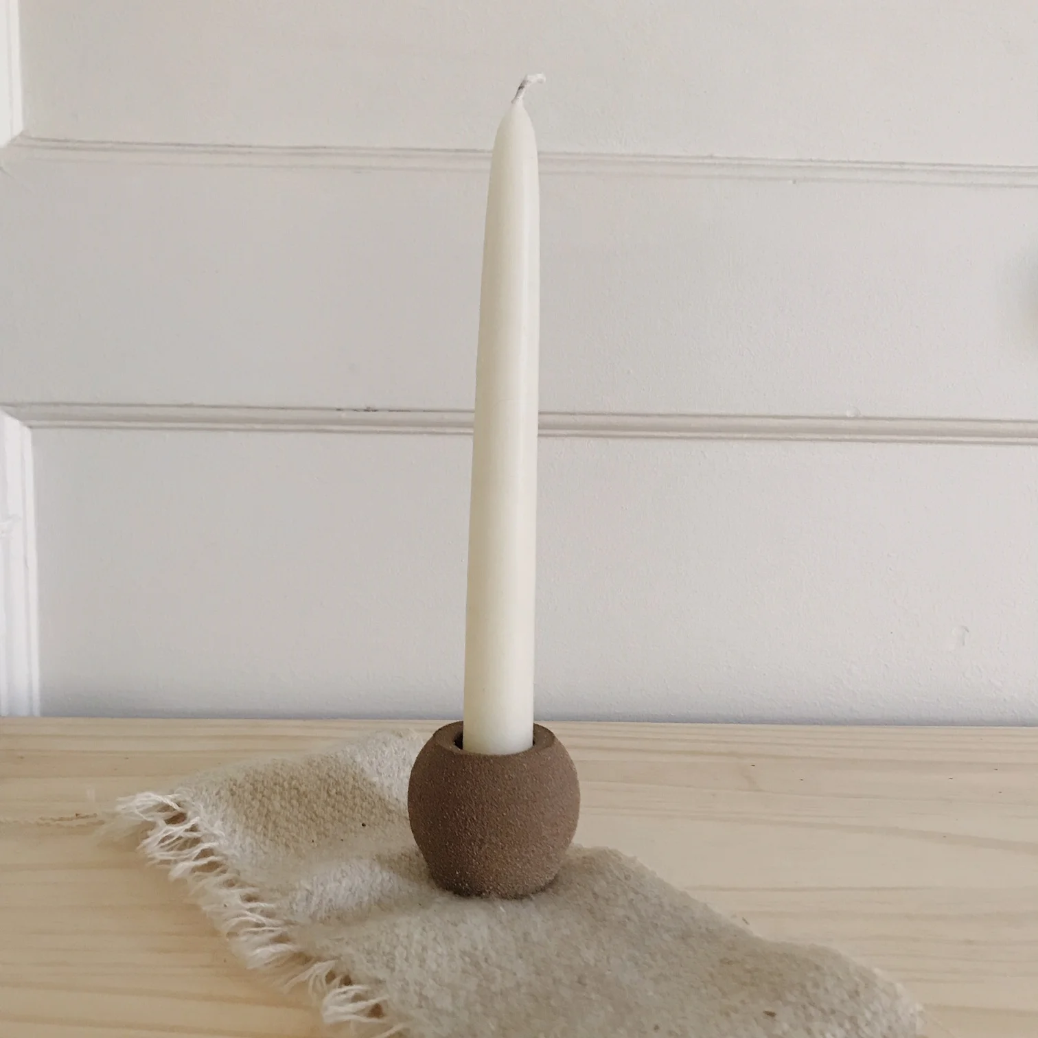 brown ceramic candleholder
