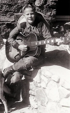 DEK Playing Guitar 1962.jpg