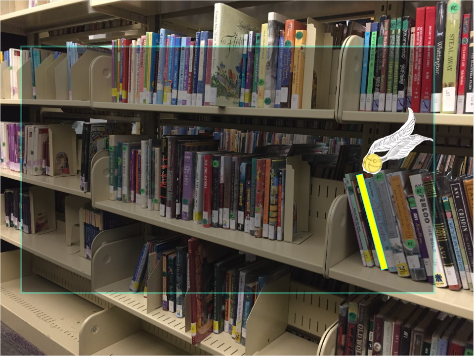 The book is highlighted on the shelf and also shown by the object from the book.