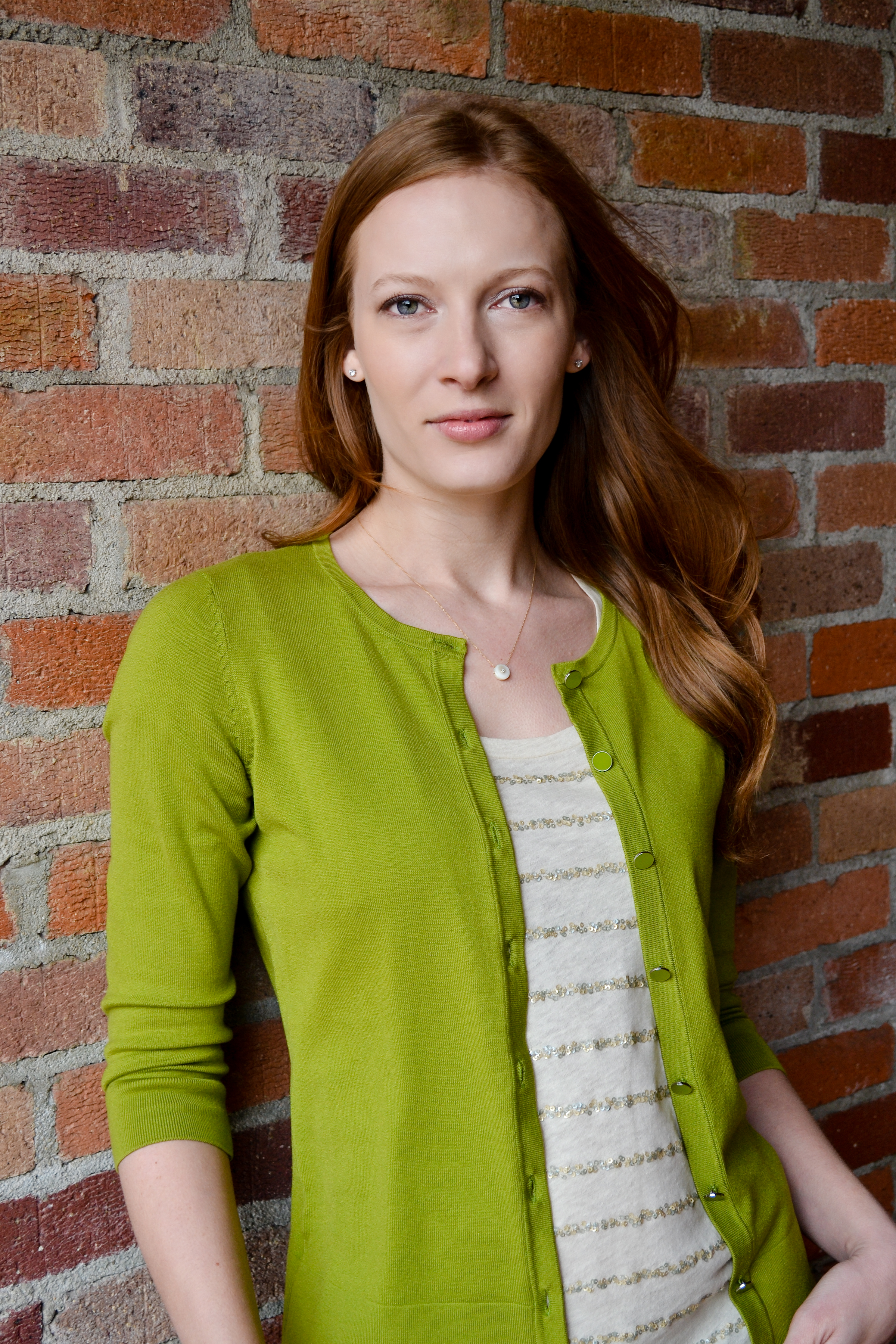 BETSY ROTH headshot (brick).jpg