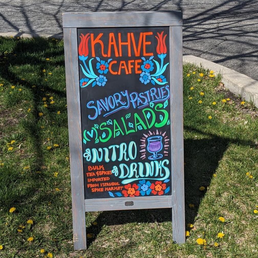 Okaaaaaay check out these beautiful signs local artist @lyra_zoe recently made for @kahvecafeslc ! 😍 These bold colors on the black background&hellip; so eye catching and charming! 

We love having Lyra teach here with us at @visualartinstitute . Th