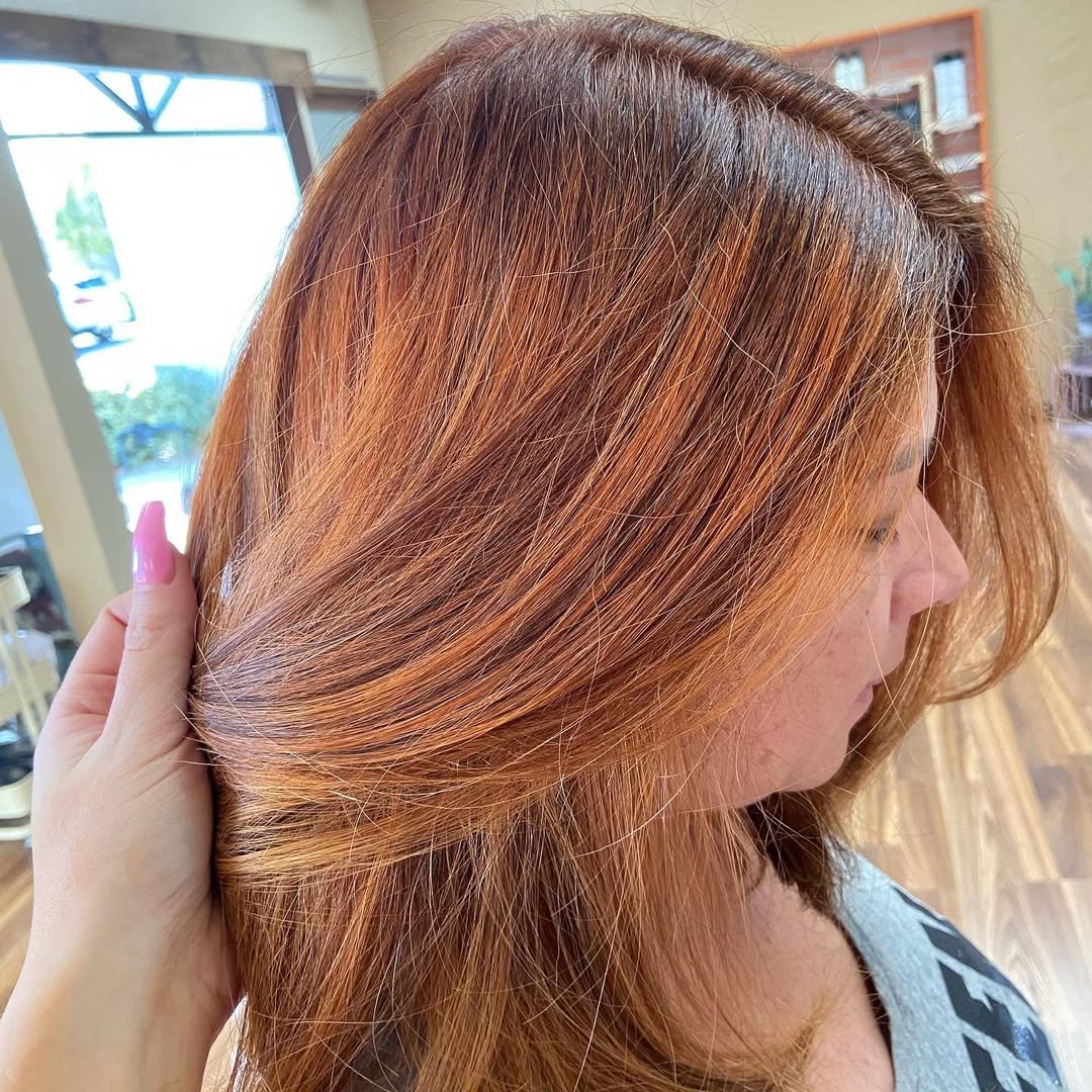 6-hour color correction complete. From dark color build up with light in the end to a gorgeous, rooted copper red balayage!