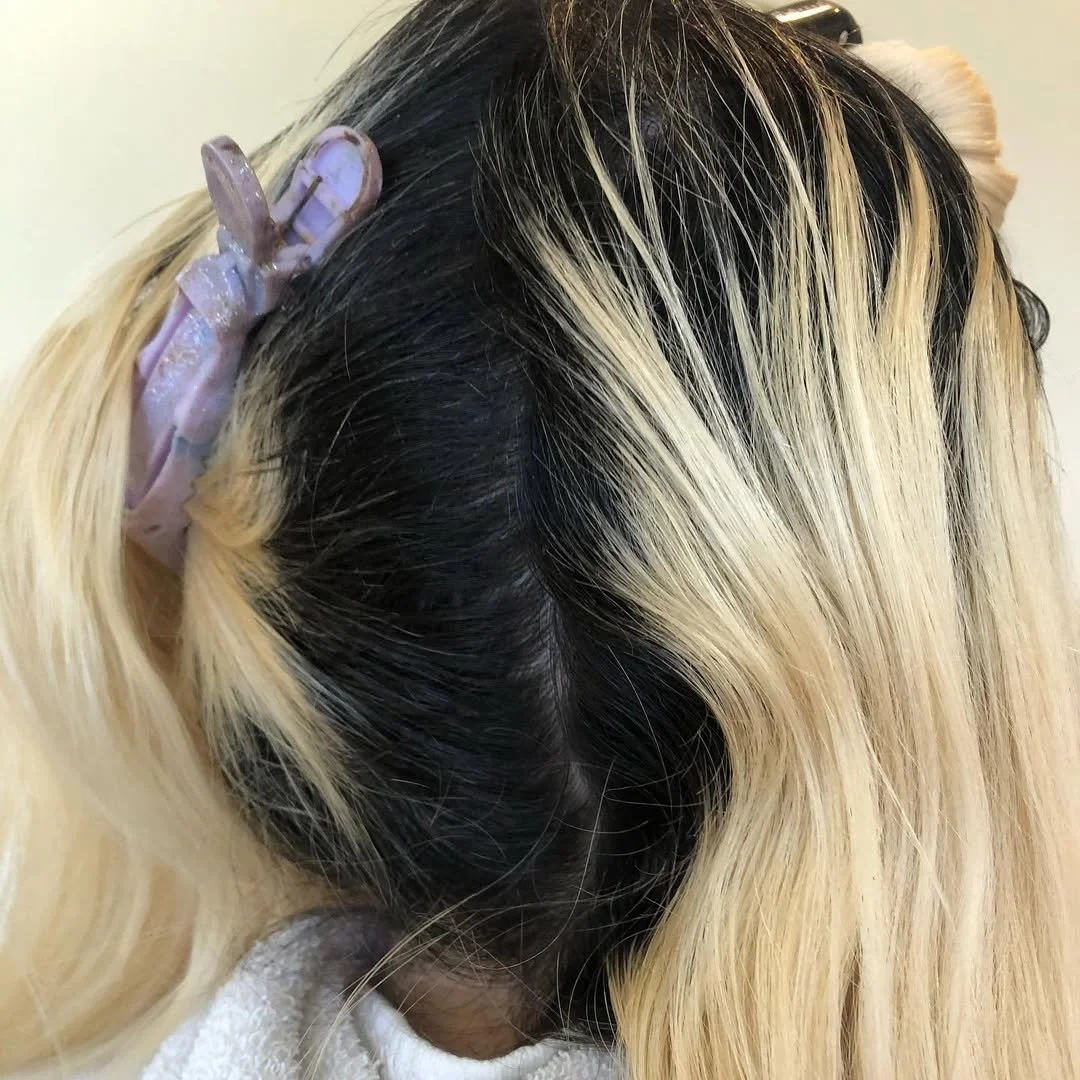 Before, blackhole roots! Lifting her roots blonde, plus a root drop for some depth. Glossed with p-32 from Oligo Professional for Champagne tone!
