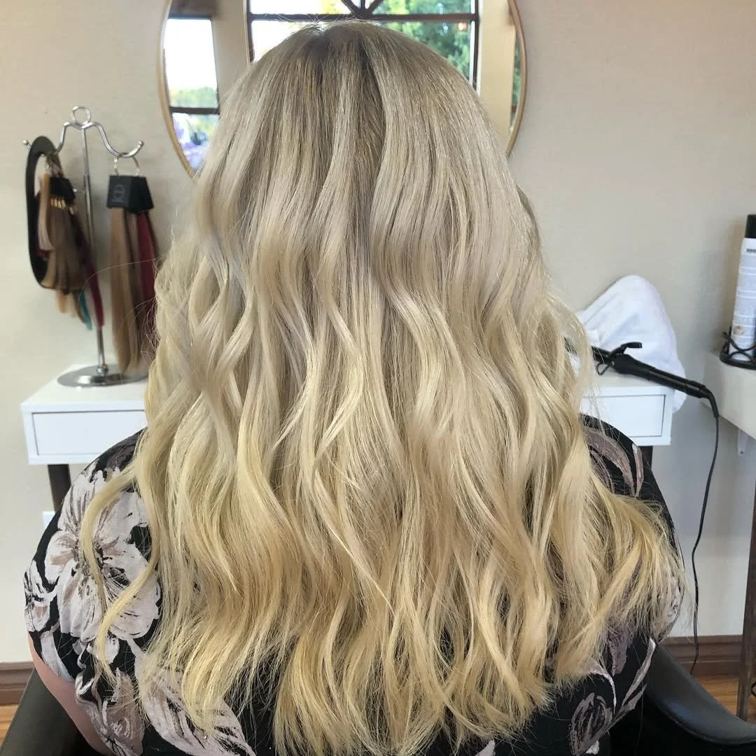 After, blackhole roots gone! Lifting her roots blonde, plus a root drop for some depth. Glossed with p-32 from Oligo Professional for Champagne tone!