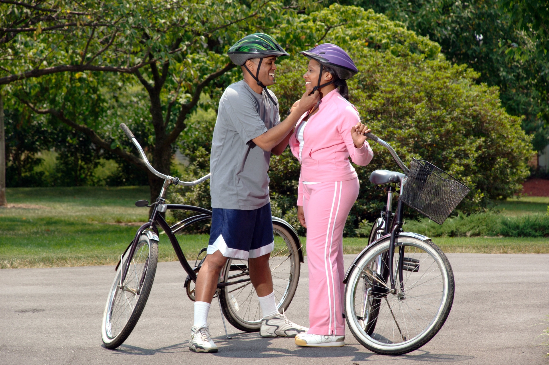 fam_17049-an-african-american-couple-preparing-to-ride-bikes-or.jpg