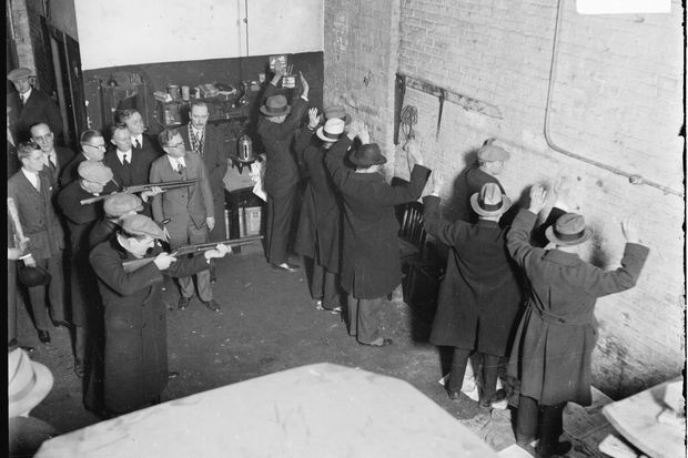 Saint Valentine's Day Massacre , where seven members and associates of Chicago's North Side Gang were murdered by a rival gang.