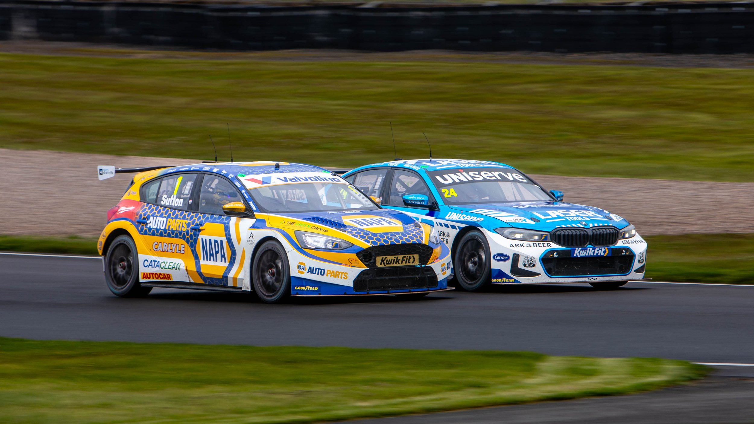  A wet Donington Park , BTCC with Ash Sutton and future campion Jake Hill,.   Date: 24th April 2024    Taken: f5.6, 1/125 sec iso 100 @ 400mm    With: Canon 5D mkIV and 70 - 200mm f2.8 + 2x extension.  