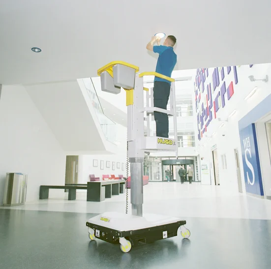 Hugo in hospital atrium working on lights.jpg