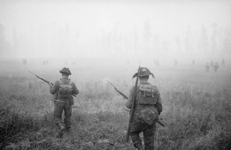 Infantry_of_'B'_Company,_6th_Royal_Scots_Fusiliers,_15th_(Scottish)_Division,_advance_during_Operation_'Epsom'_in_Normandy,_26_June_1944._B5957.jpg