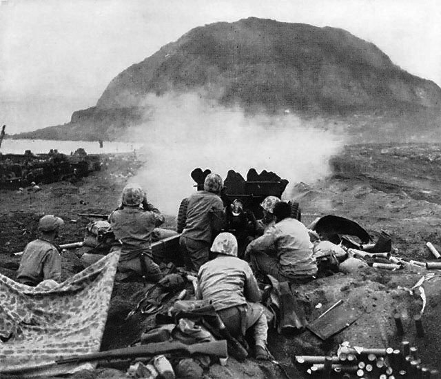 7mm Gun fires against cave positions at Iwo Jima