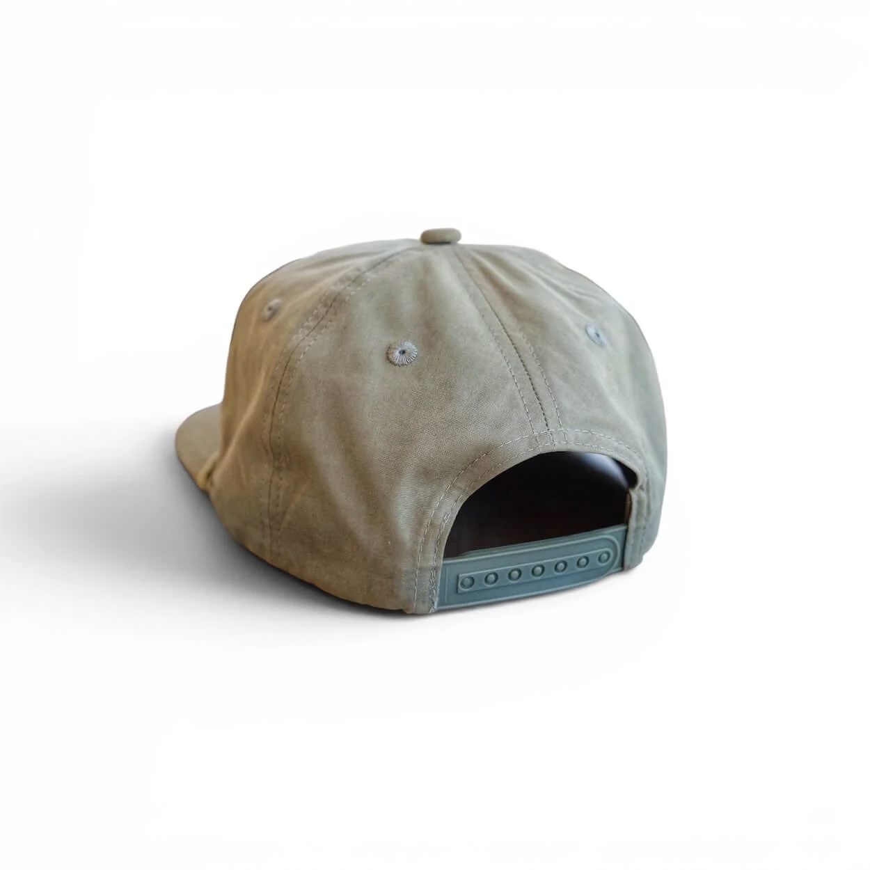 the back of an olive colored cotton rope snapback hat with ‘Anclote Gulf Coast Brand’ embroidered patch, flat brim, studio product photo. (Copy)