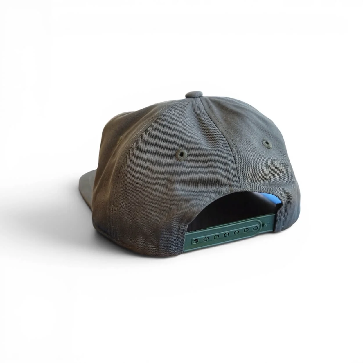 The back of an olive-colored Fresh off the Boat snapback cotton hat with blue embroidered patch on a clean white background.