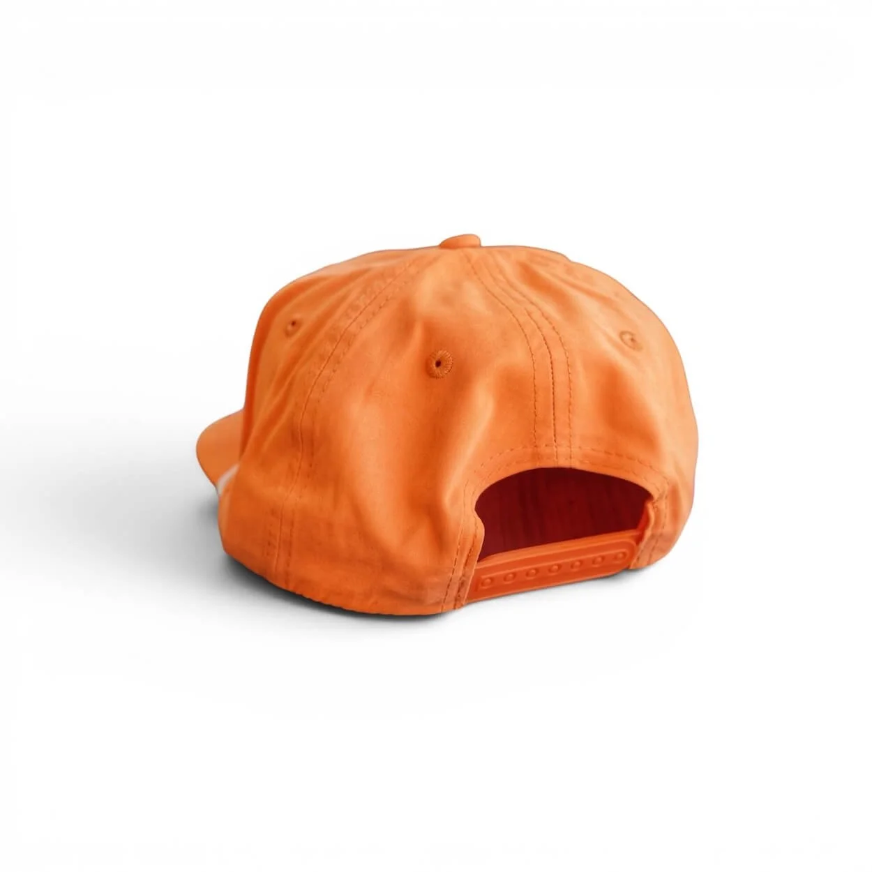 The back of an orange snapback rope hat with ‘Gulf Coast’ orange embroidered patch, flat brim, studio product photo.