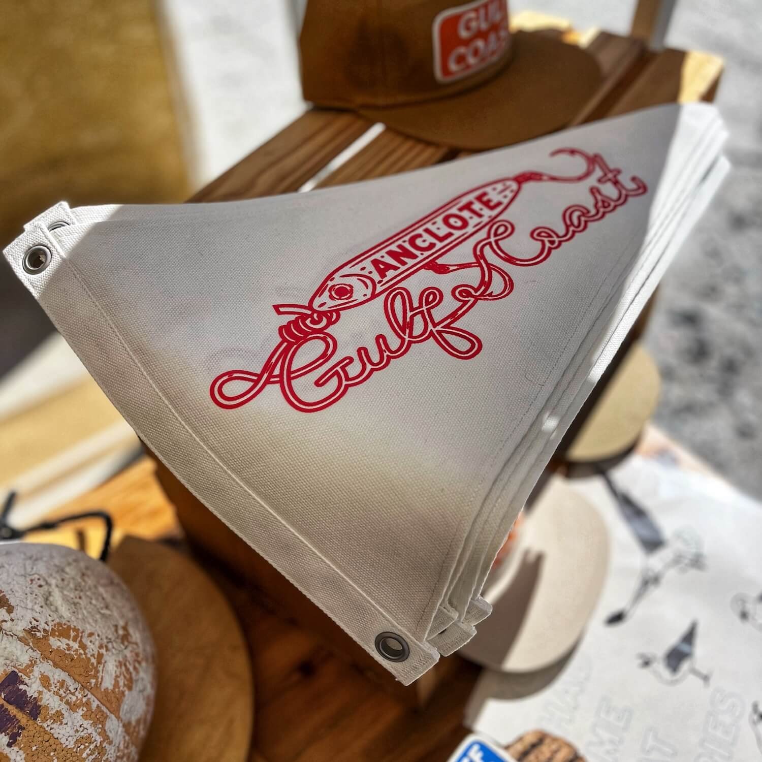 Lifestyle photo of the anclote pennant flag.