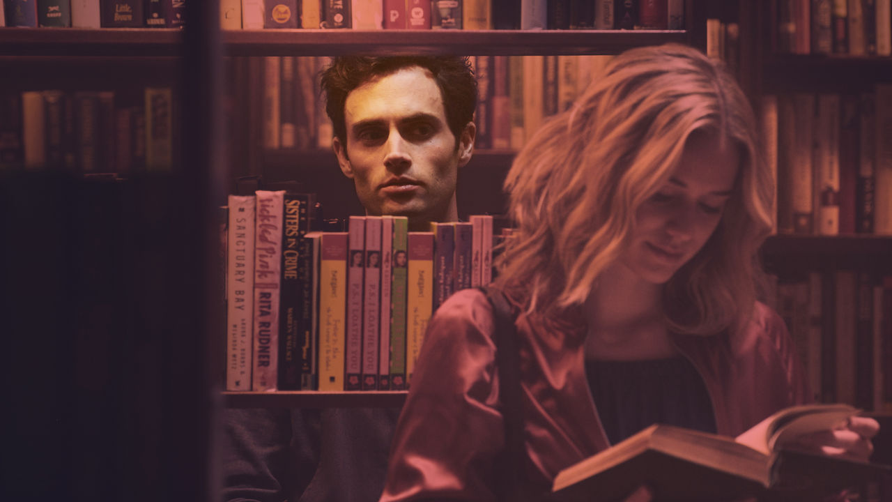 Penn Badgley and Elizabeth Lail in Netflix’s YOU // Image via Netflix.
