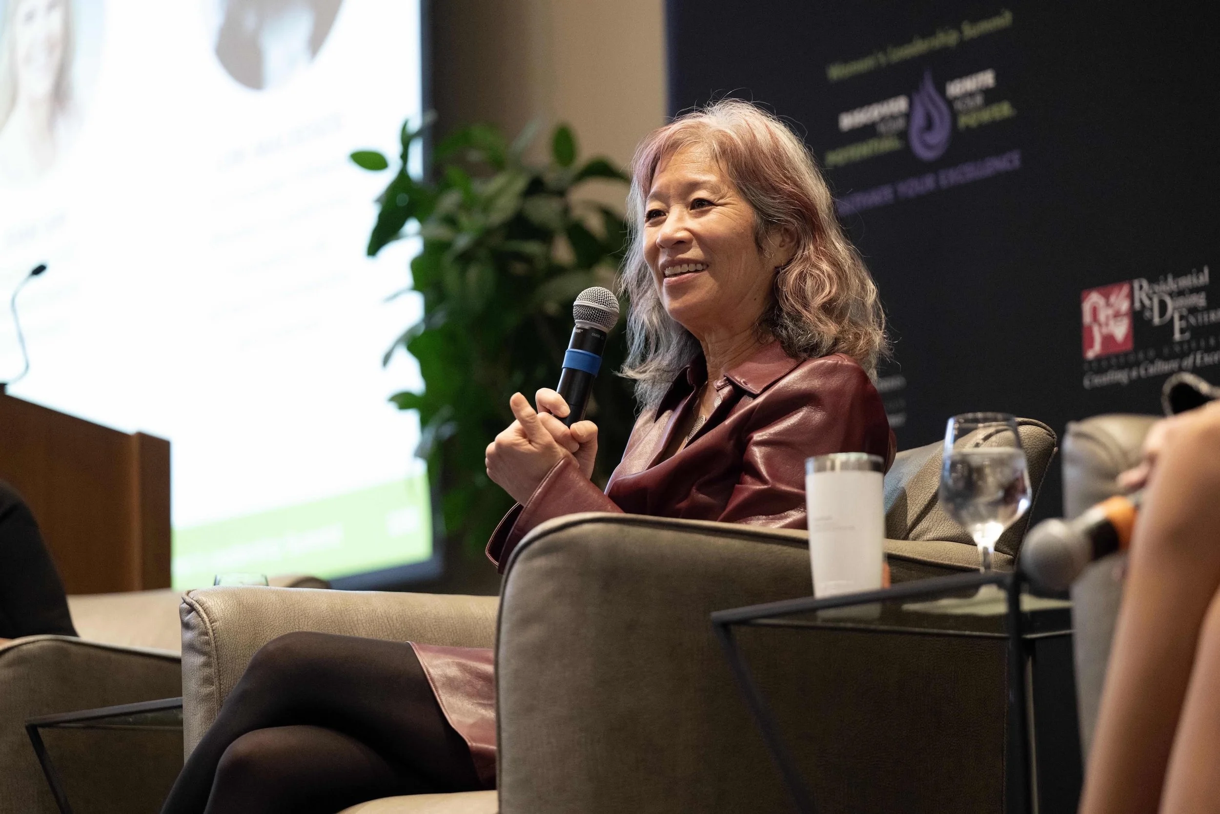 Lori talking at a conference