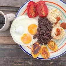 Traditional Guatemalan Breakfast: Eggs, plantains, beans, & toast!