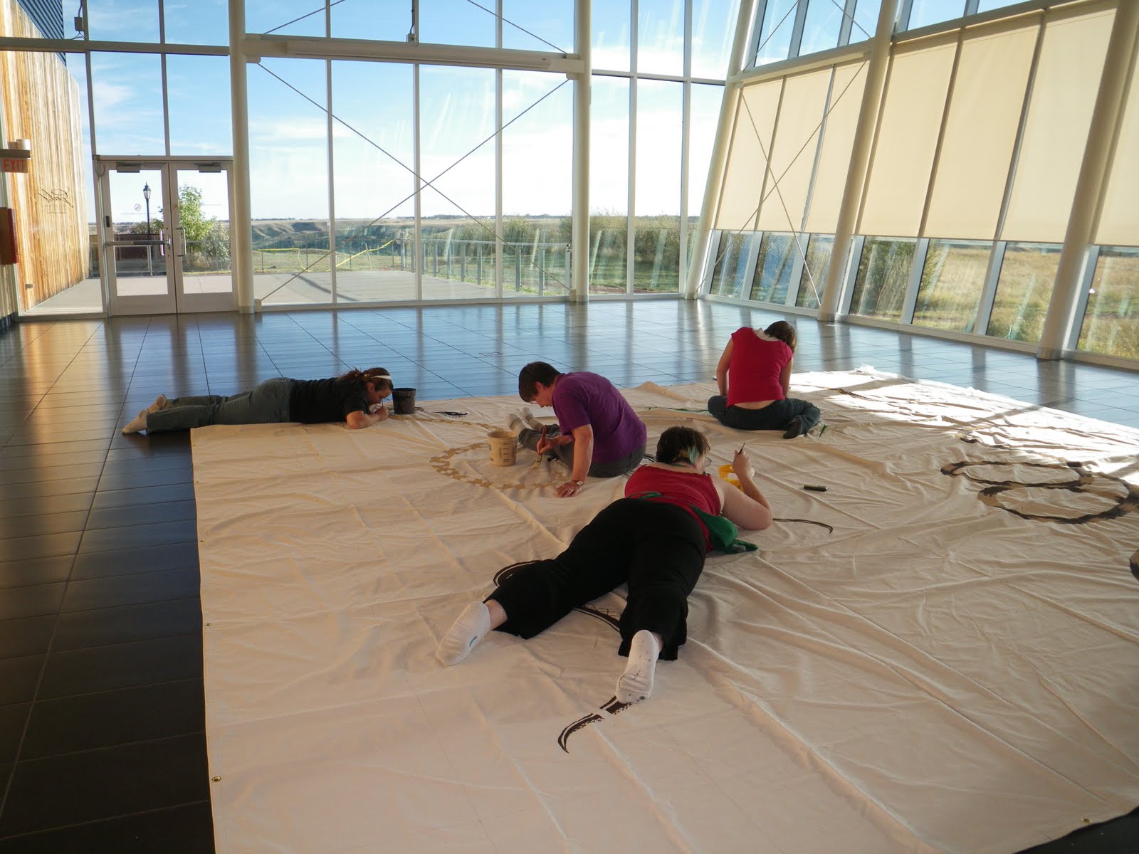 Volunteers painting snakes