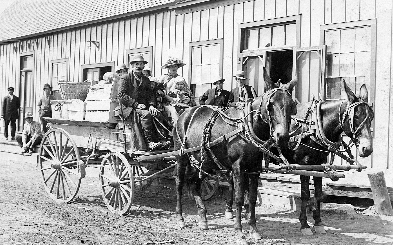  James Dodge family shortly after arriving in Lethbridge in front of the train station. 1913. Galt Archives 19841022000 