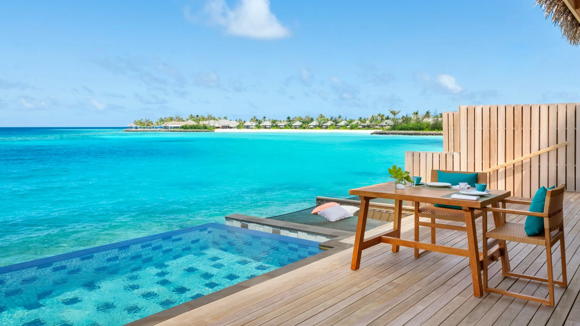 Hilton Maldives Amingiri Resort &amp; Spa brings you gloriously in touch with nature in a modern overwater villa with glass panels in the floor allowing views of the turquoise waters below and features a private pool and sundeck with dining area.
@hi