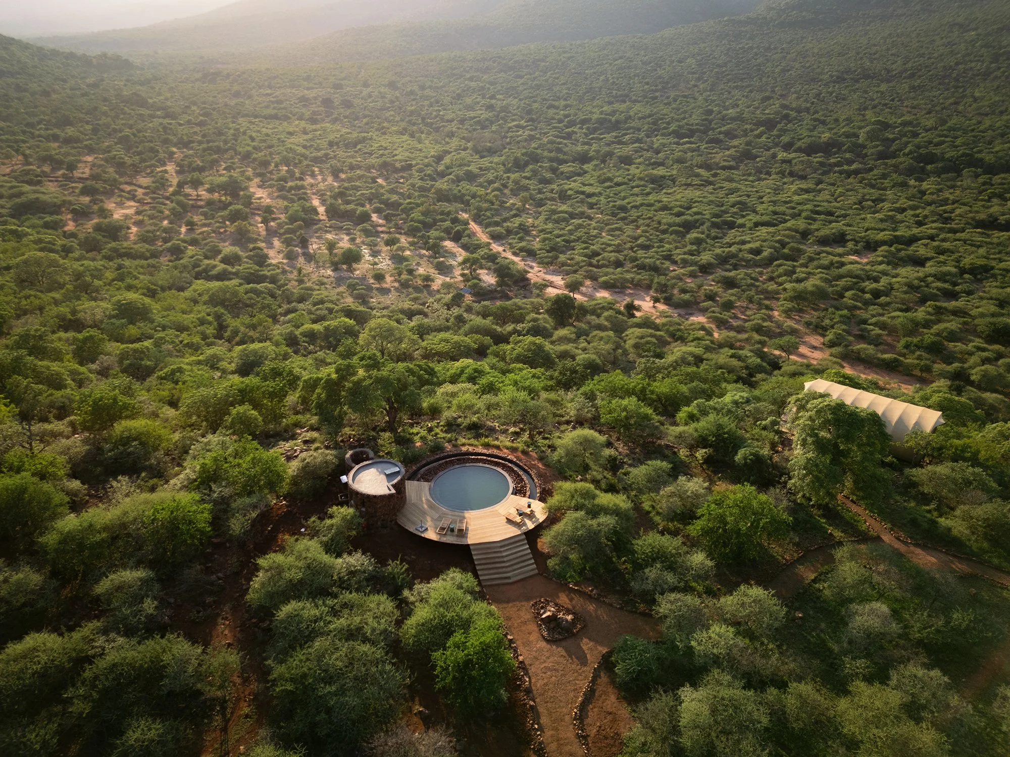 A cool dip awaits after a day of exciting adventures in nature at Few and Far Luvhondo.

@fewandfar.luvhondo