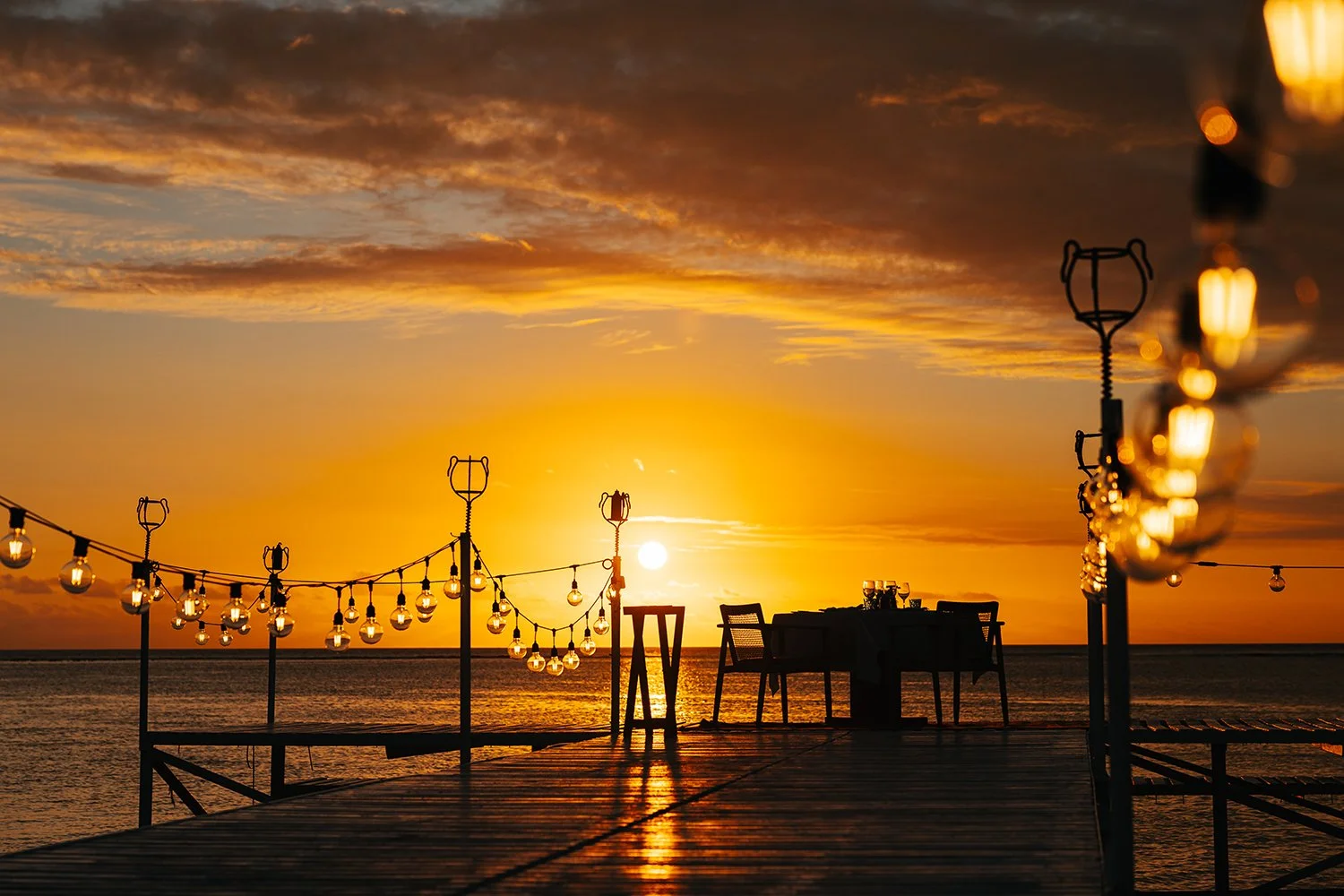 Sunset dining on the jetty is part of the vibrant culinary journey at Maradiva Villas Resort &amp; Spa in Mauritius. 

@maradivavillas