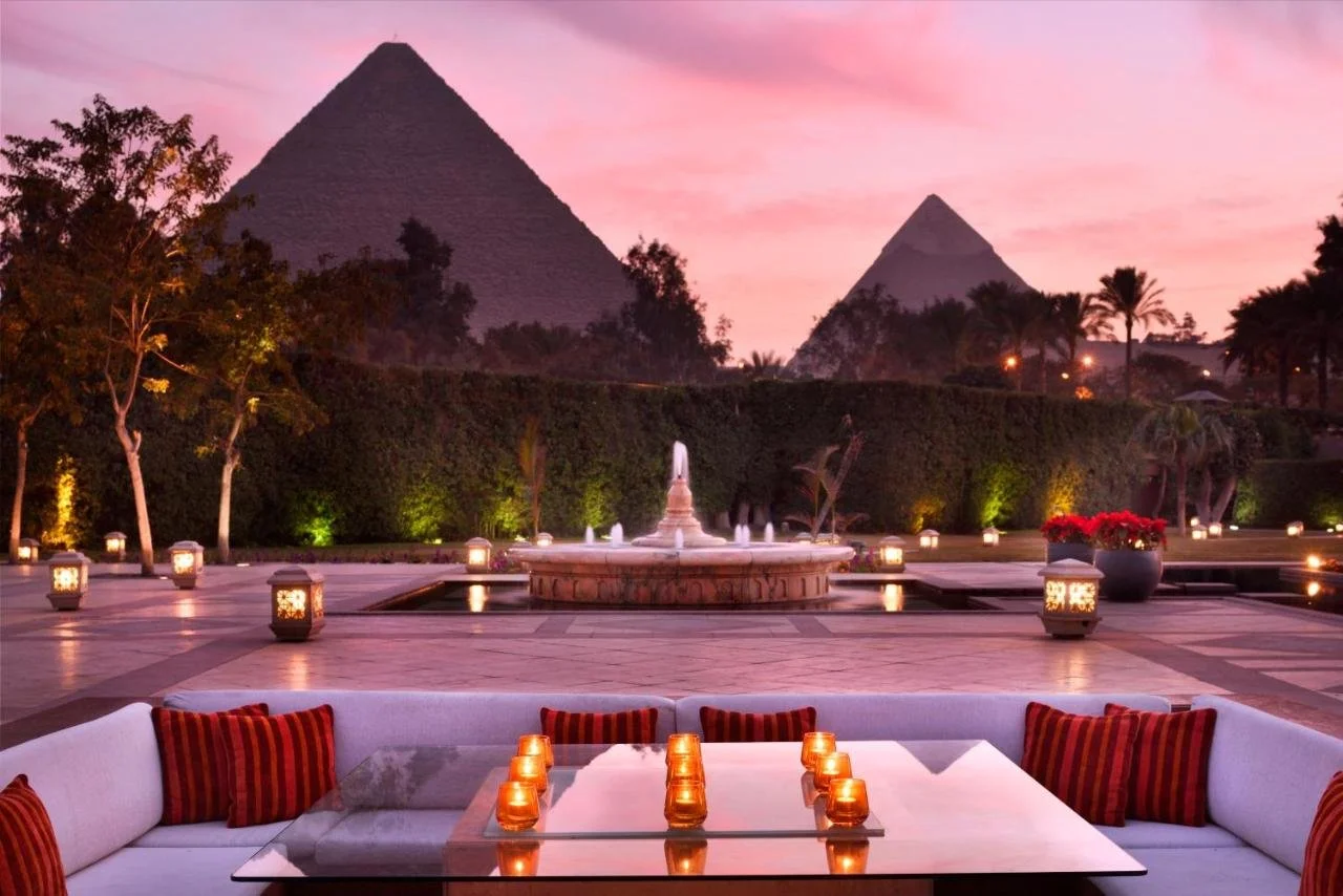 Experience timeless romance arranged by Traveline at Mena House Cairo, where sunset dining unfolds beneath the shadow of the pyramids.

@travelineegypt