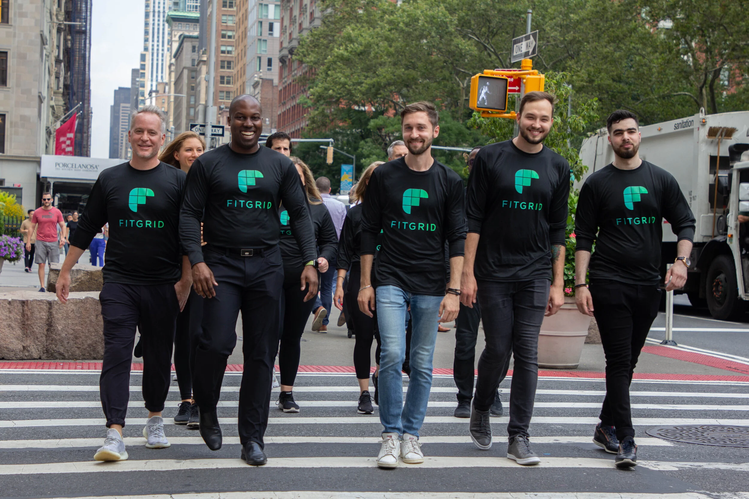 team walking down city street nyc(1).jpg