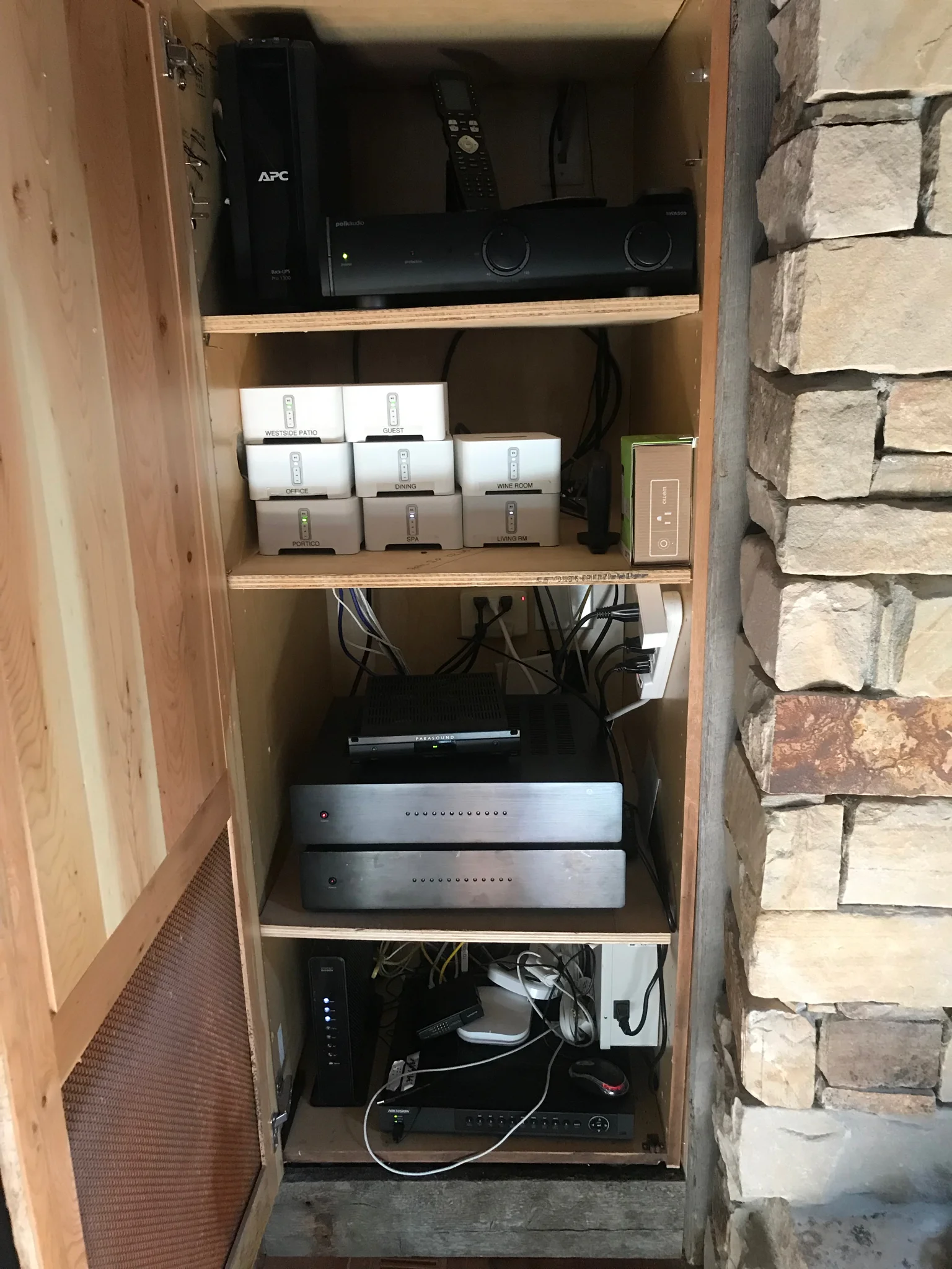   Before  shot of an unorganized equipment rack at a commercial space in Utah — this client needed help simplifying the integration of their audio and visual systems. 