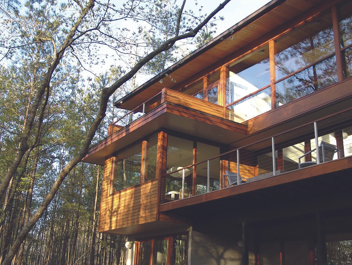Ron and Sandra Simblists’s home was featured in the 2018 MA! Modern Architecture Tour and has expansive views of forest.