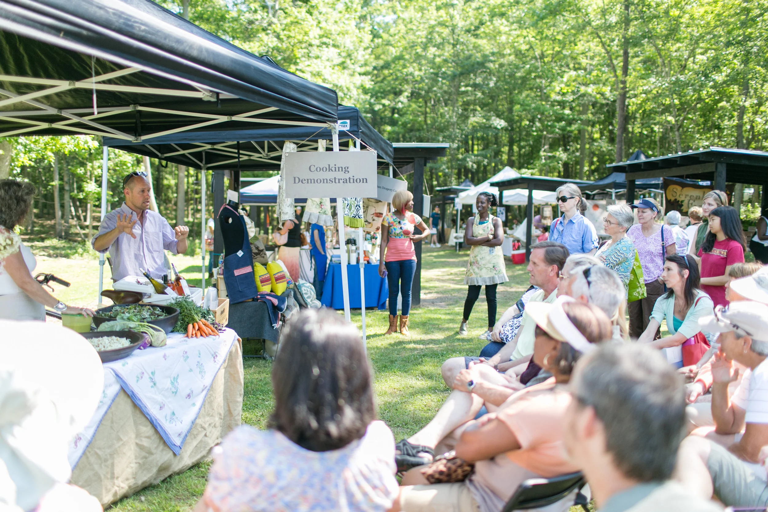Cooking demonstrations are a popular event at the Serenbe Market. Photo by J. Ashley Photography .