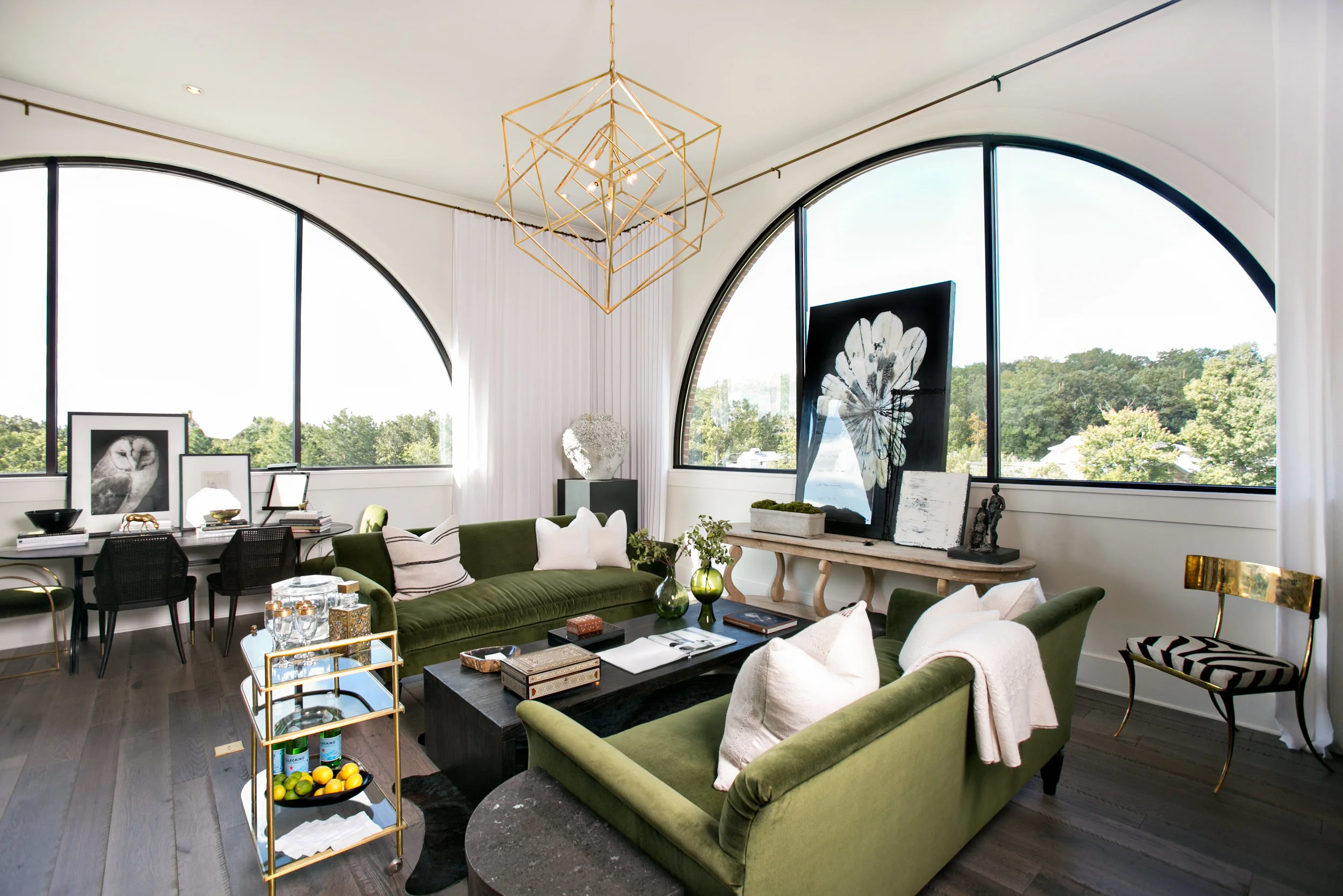 2016 Showhouse includes 16-foot Roman arched windows providing unparalleled birds-eye views of Serenbe Stables, Serenbe Farms and Grange Lake. Photo by J. Ashley Photography .